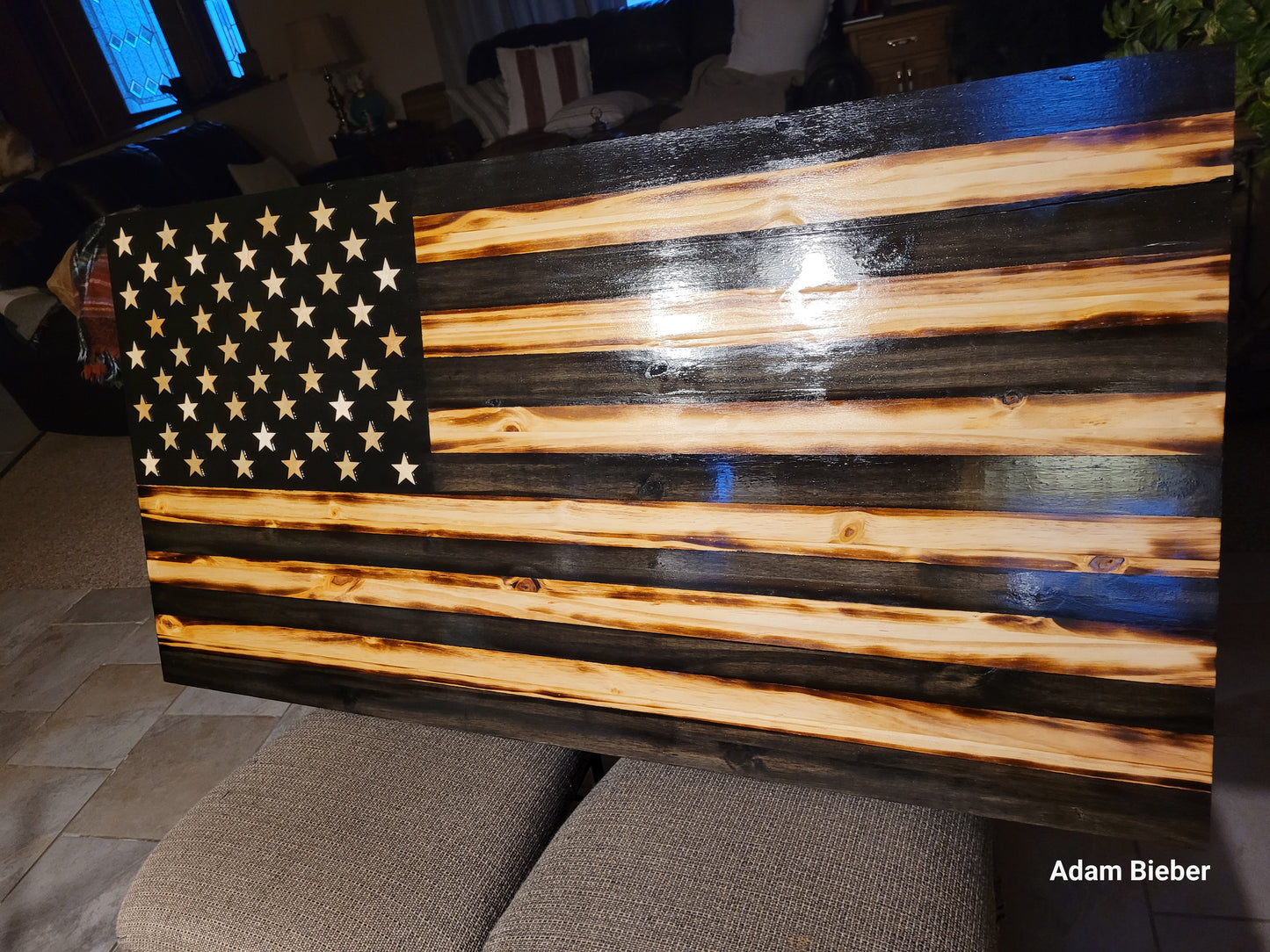 Black and tan wood flag