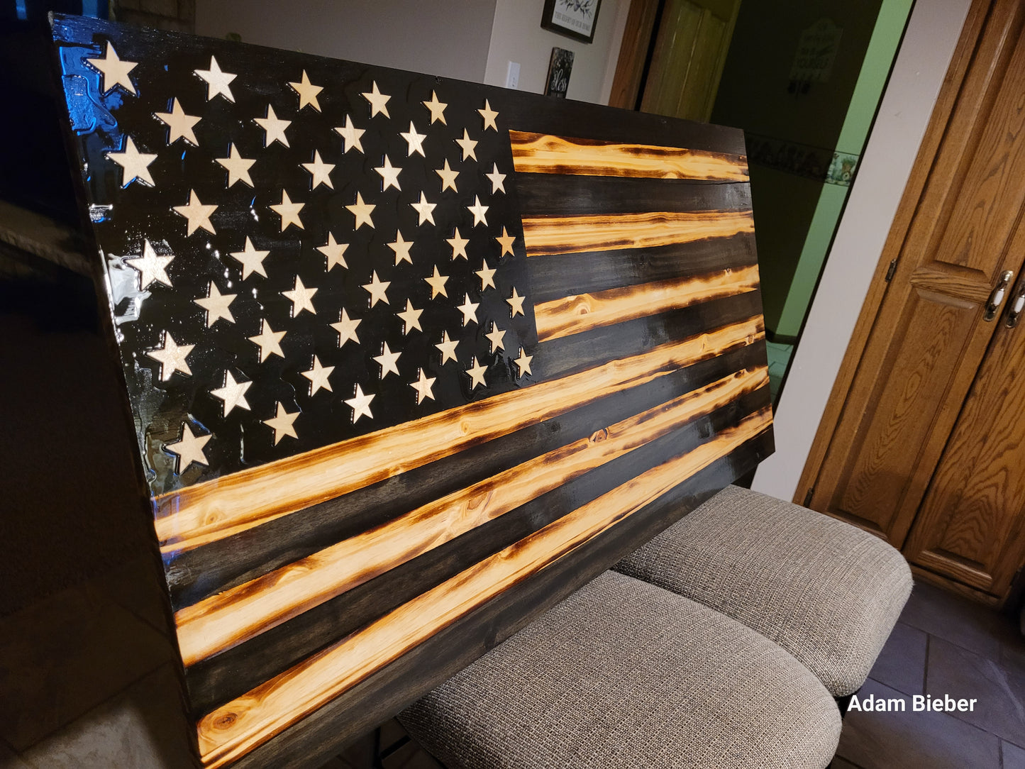 Black and tan wood flag