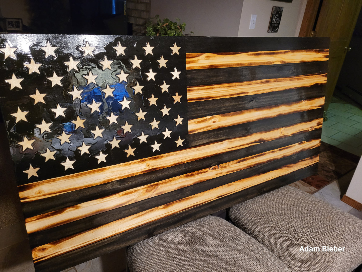 Black and tan wood flag