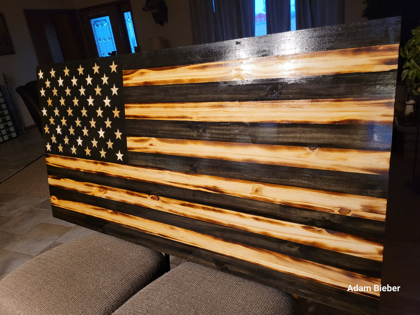 Black and tan wood flag