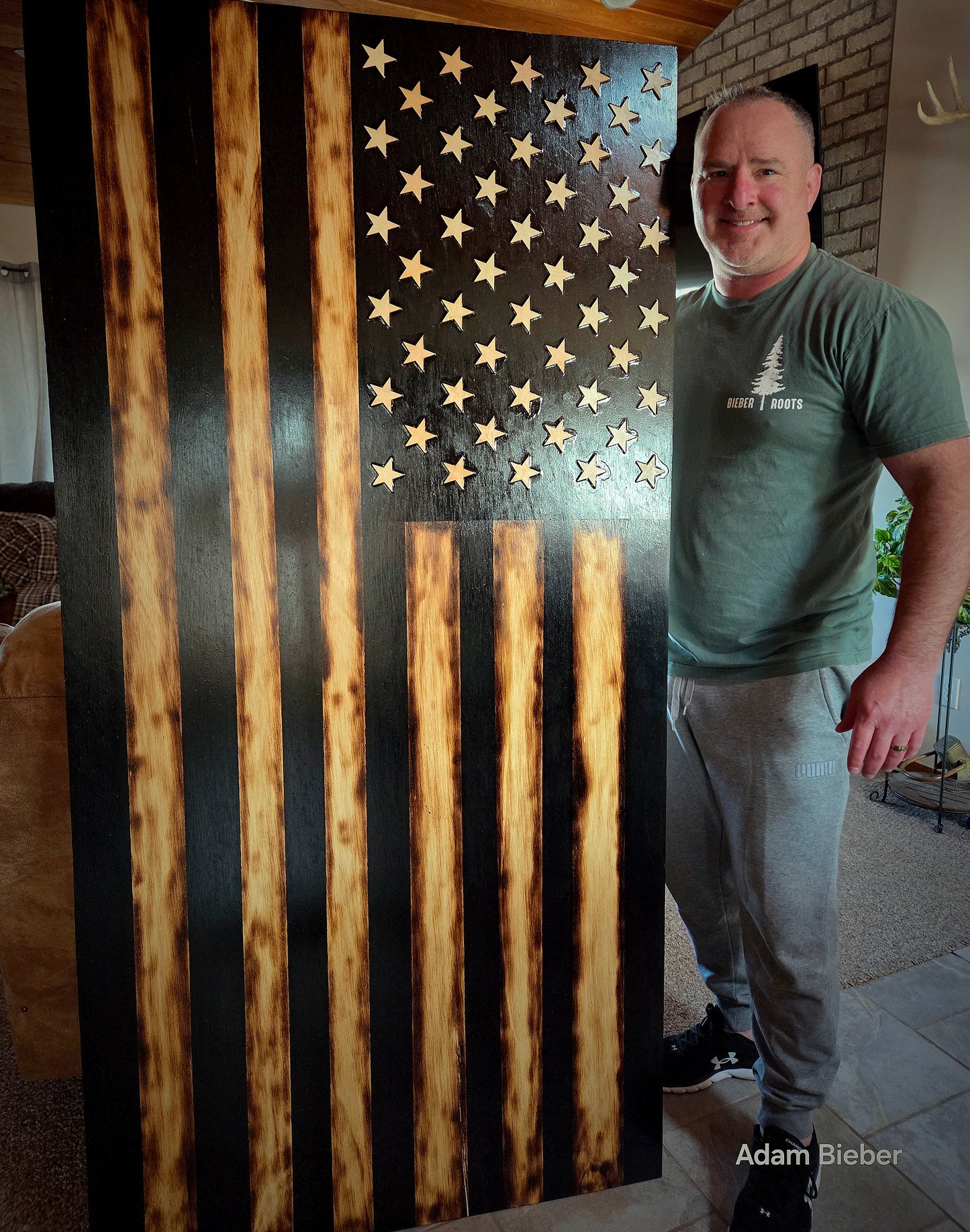 Black and tan wood flag