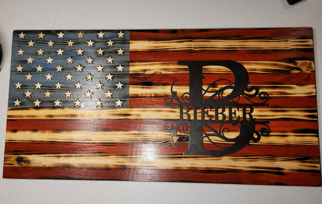 Customized American wood flag with metal name crest.